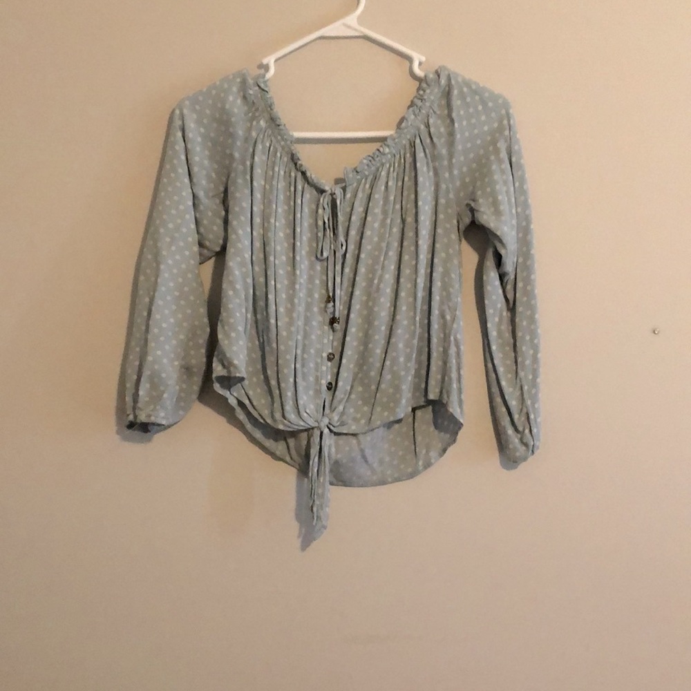 A off the shoulder, button down, crop top